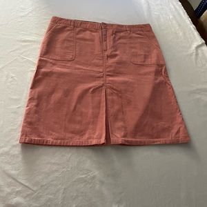 Old Navy pink corduroy skirt. Sits below the waist and size 14